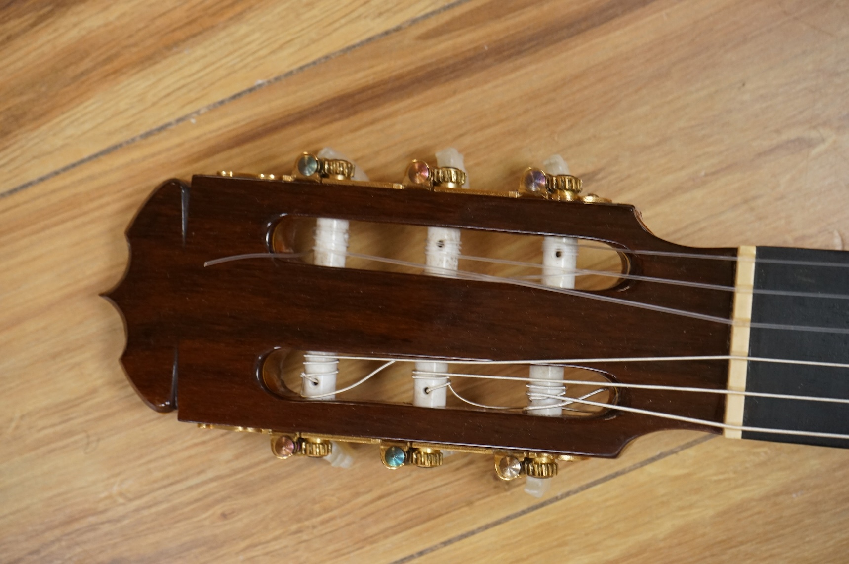 A Ricardo Quiles classical guitar, a Ramirez copy, with spruce top, Indian rosewood back and sides and ebony fingerboard.